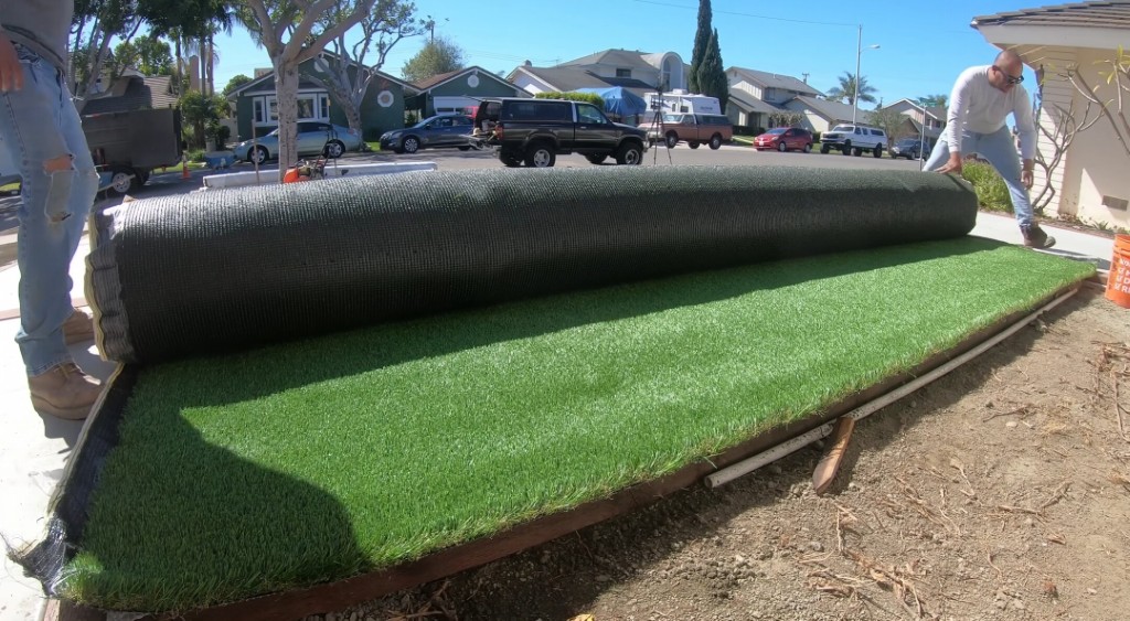 Professional artificial grass installation crew working in West Allis